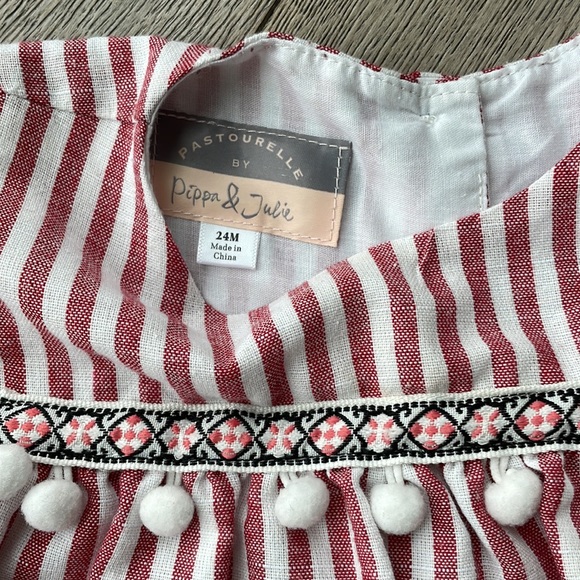 Striped cold shoulder toddler dress with pom pom detail - Picture 2 of 3